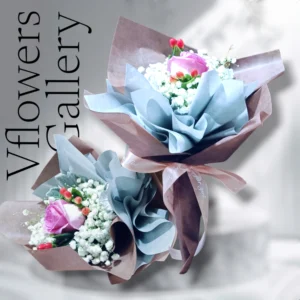 Roses with baby's breath, hypericum & sliver leaf